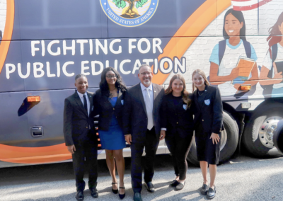 Student officers pose with Secretary Cardona